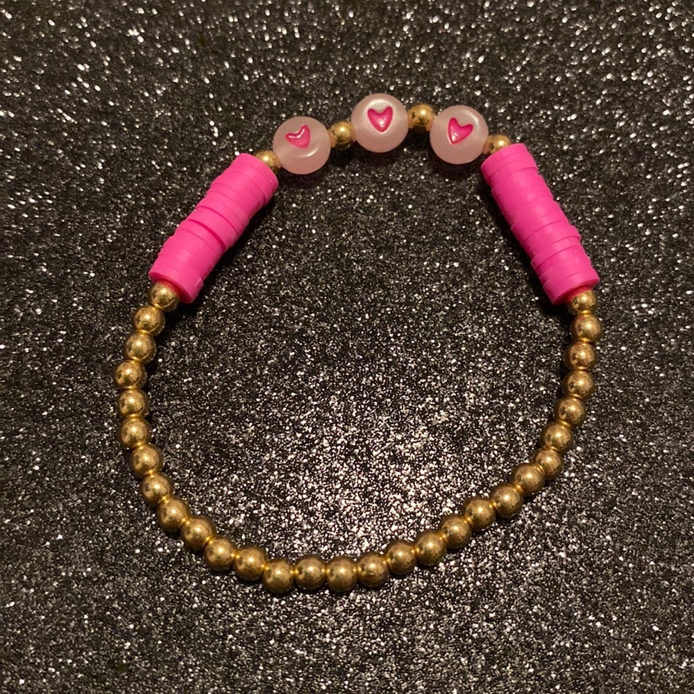 Girls faux gold stretch beaded pink/heart glow in the dark bracelet